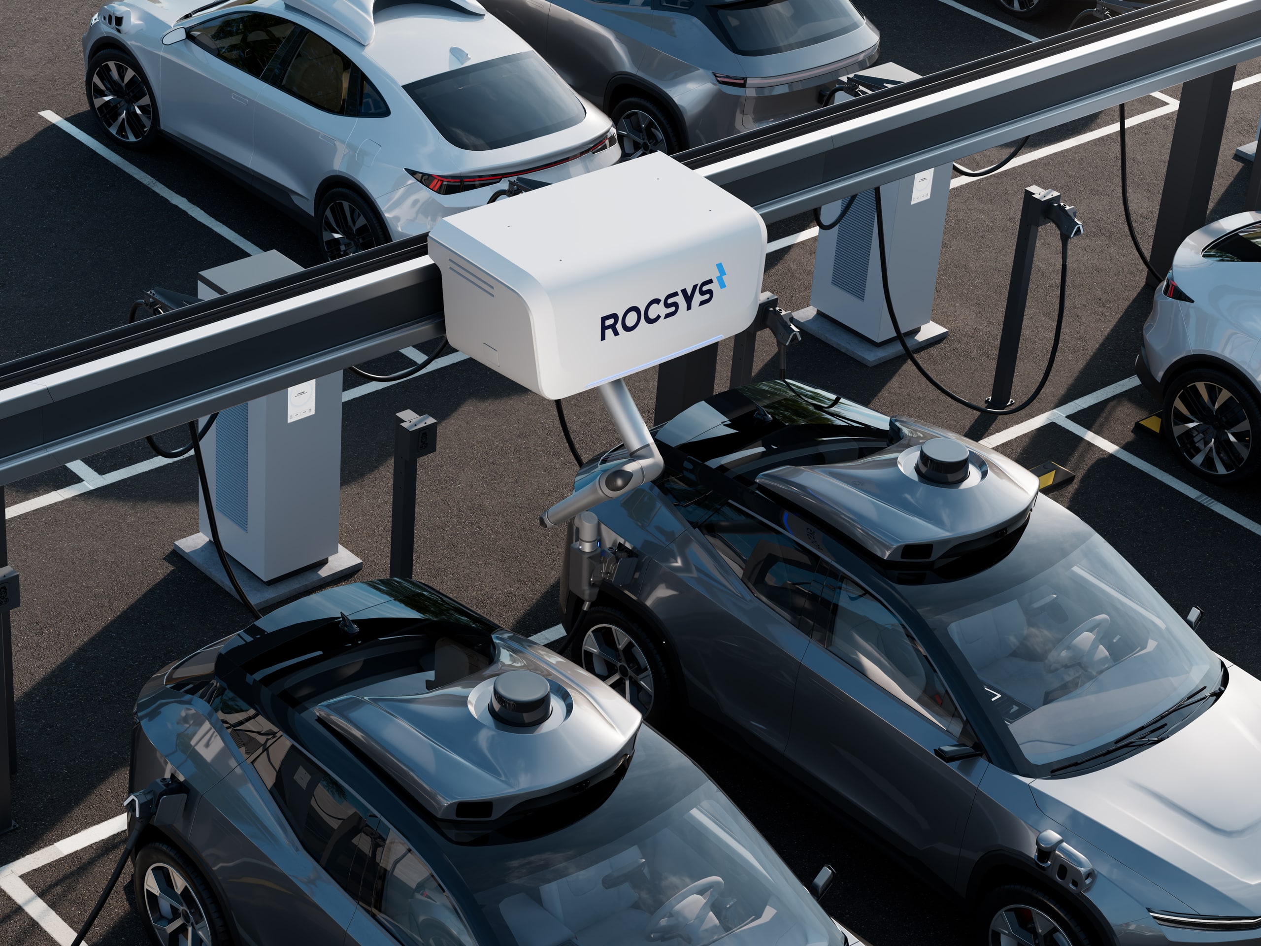 Overhead view of a Rocsys M1 unit automatically charging a robotaxi